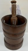 An 18th Century turned lignum vitae mortar and pestle,