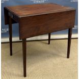 A 19th Century oak rounded rectangular drop-leaf Pembroke table with single end drawer on turned