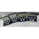 A collection of seven boxed Morgan Mint 24 carat gold plated statehood quarter dollars special
