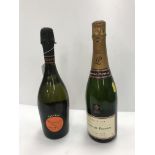 One bottle Laurent Perrier Champagne and one bottle Piccini Prosecco