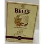 One pottery bell-shaped bottle Bell's Extra Special Old Scotch Whisky Christmas 1997 8 year old