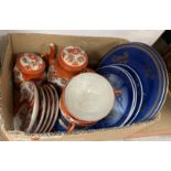 Two Wedgwood powder blue and gilt decorated plates with Chinese temple lion decoration manufactured