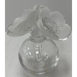 A Lalique "Les Anemones" perfume bottle of globe form, signed "Lalique" to base, 16 cm high,
