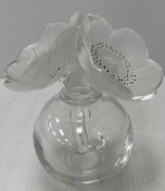 A Lalique "Les Anemones" perfume bottle of globe form, signed "Lalique" to base, 16 cm high,
