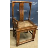 A Chinese elm raffia seated curved back elbow chair (one arm missing) and a folding square