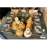 A box containing various stoneware/salt glazed beer bottles including Thomas's Stone Beer,