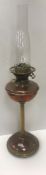 A 19th Century Hinks's No 2 duplex oil lamp with brass column support and circular domed copper