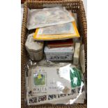 A basket containing mainly unmounted British and World stamps,