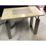 A Sienna marble topped and polished steel single drawer work table with suede covered glass panel