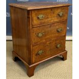A burr walnut veneered chest of three drawers in the 18th Century manner, 58.5 cm wide x 41.