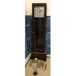 A 1930s oak cased long case clock,