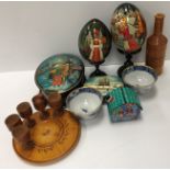 A collection of modern Russian lacquered items including a box of cottage form decorated with