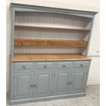 A modern grey and white painted and polished pine dresser,