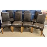 A set of eight modern faux crocodile skin covered high back dining chairs on square tapered light