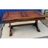 An oak draw leaf dining table in the 17th Century style,