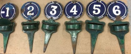 A set of six Jaques of London enamelled cast iron and enamelled golf green markers numbered 1-6