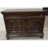 A circa 1900 Continental oak dresser, the top with moulded edge over a slide,
