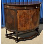 A walnut and seaweed marquetry inlaid side cabinet in the 17th Century manner,