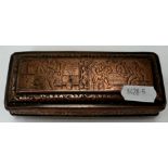 An 18th Century Dutch engraved copper tobacco box with various figural scenes to the top and base