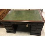 An early to mid 20th Century mahogany framed double pedestal desk,