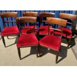 A set of six Regency mahogany bar back dining chairs with upholstered seats on turned and reeded