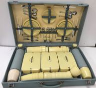 A mid 20th Century Sirram picnic hamper with fittings including thermos flasks etc