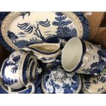 A collection of Booths Real Old Willow pattern dinner and tea wares