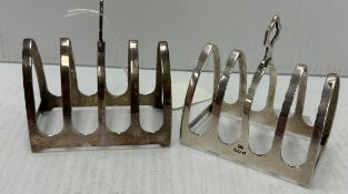 A matched pair of George VI silver four section toast racks (by Emile Viner, Sheffield 1937/1938),