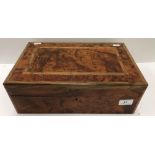 A burr cedar humidor with hygrometer containing a collection of various cigars including twelve