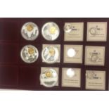 A collection of seventeen European currencies commemorative medallions or coins various including