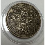 A white metal coin as a Victorian "Gothic" florin 1877 17.