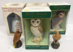 A collection of four Royal Doulton Whisky bottles including "Whyte & Mackay Short Eared Owl" and