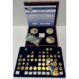 A collection of European coinage including three Great Popes through History medallions including