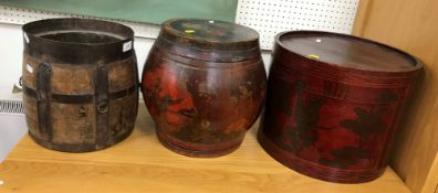 A Chinese lacquered barrel food jar and cover 34 cm diameter x 32 cm high together with a red