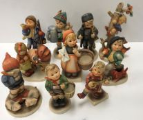 A collection of ten Goebal Hummel figures including "Here ye, here ye", "Culprits", "For Father", "