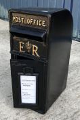 A modern reproduction ER postbox in black, 32 cm deep x 52 cm high