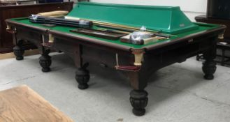 A mahogany framed full size snooker / billiards table by Burroughes & Watts Ltd of London, the green