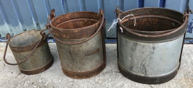 A set of three graduated vintage style milk buckets, the largest 39 cm diameter x 41.