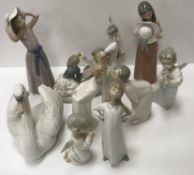 A collection of twelve various Lladro fi