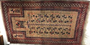 A vintage Belouch prayer rug, the centra