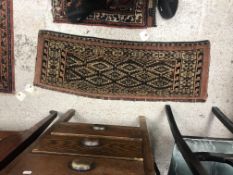 A Torba rug, the central panel set with