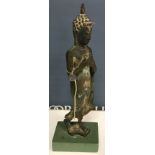 A Thai verdigris patinated bronze figure