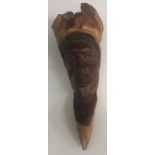 A Native American carved ironwood head s