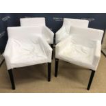 A set of four IKEA upholstered low armch