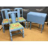 A blue painted drop-leaf kitchen table,