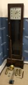 A 1930s oak cased long case clock, the m