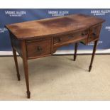 An Edwardian mahogany side table, the pl