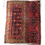 A Caucasian rug, the main panel set with