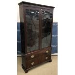 An Edwardian mahogany bookcase cabinet,