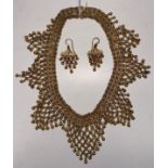 A Continental filigree work necklace wit